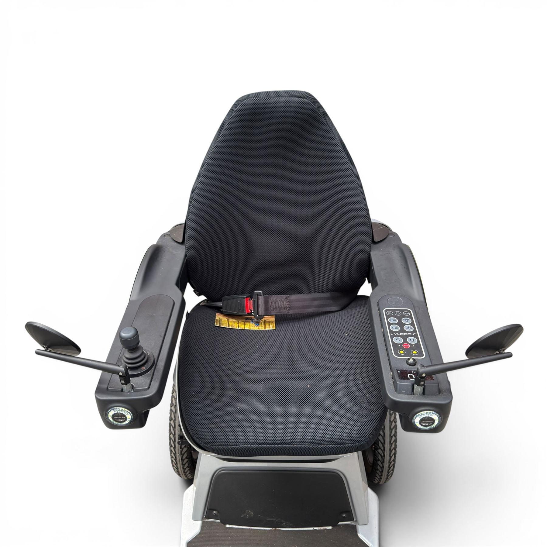 TGA Scoozy - mobility scooter, four wheel model with joystick controls, front storage bag, lights and grey and black bodywork.
