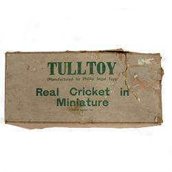 1940s Tulltoy by Phillip Segal Toys 'Real Cricket in Miniature' circa 1947, includes thirteen lead cricketers, six with red hats and seven with blue, two umpires, two sets of wickets, one metal ball, felt cricket pitch with white stitching and metal batting and bowling fixtures, contained within original box