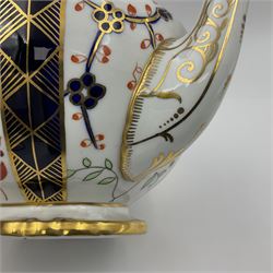 Early 20th century Royal Crown Derby teapot, decorated in a variant of the Imari pattern with blue and red prunus blossoms, with printed mark beneath including illustration date code for 1927, H14cm
