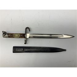 Austrian Model 1895 Carbine NCO's knife bayonet with 24.5cm fullered steel blade and applied embossed brass crested badge to the grip, in steel scabbard L38cm overall