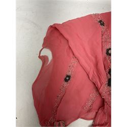 Art Deco pink flapper type beaded dress, with floral motifs and tasselled clear and black beadwork throughout