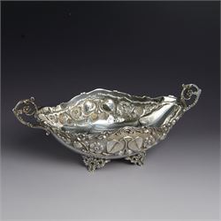 Greek silver strawberry basket, of oval form with scrolling floral handles and embossed st...