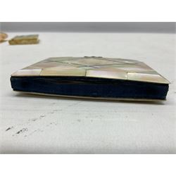 Mother of pearl and abalone inlaid card case, with central diamond shaped panel engraved with foliate decoration, together with a simulated mother of pearl card case of book form with green sun rays to cover, and simulated wood effect cigarette case with hinged lid with diamante style banding, largest L10cm