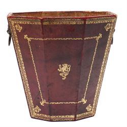 An early 19th-century Regency burgundy leather waste paper bucket of tapering octagonal fo...