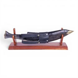  Early 20th century Nepalese kukri knife with leather scabbard, L41cm