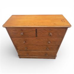 Mid Victorian flame mahogany chest of drawers, the moulded bow front top over two short and three long graduated drawers, fitted with turned wooden knob handles, flanked by rounded front corners continuing to plain sides, raised on a plinth base