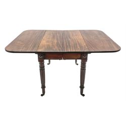 19th century figured mahogany drop leaf telescopic Pembroke dining table with leaf, rounded rectangular top with lobe moulding, plain frieze with turned roundels at each leg, turned and reeded Gillows type supports with brass cups and castors, 194cm x 108cm, H72cm