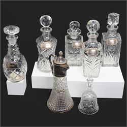 Six crystal decanters, four with silver labels and one with silver plated mount, and one etched glass dinner bell, tallest H30cm 