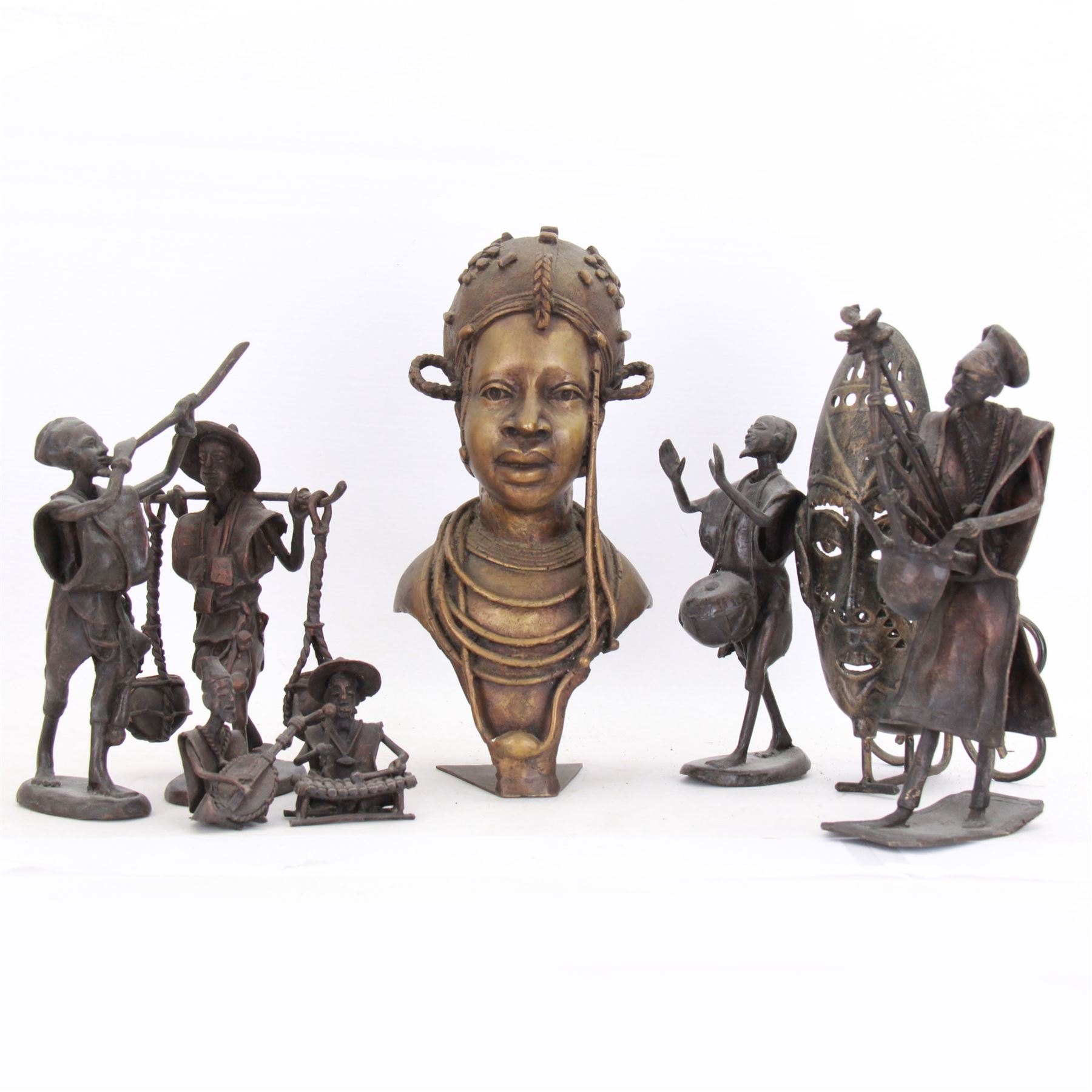 Pair of Benin bronzed busts depicting the Oba of Benin and Queen, together with with other bronzed figures, bust H31cm 
