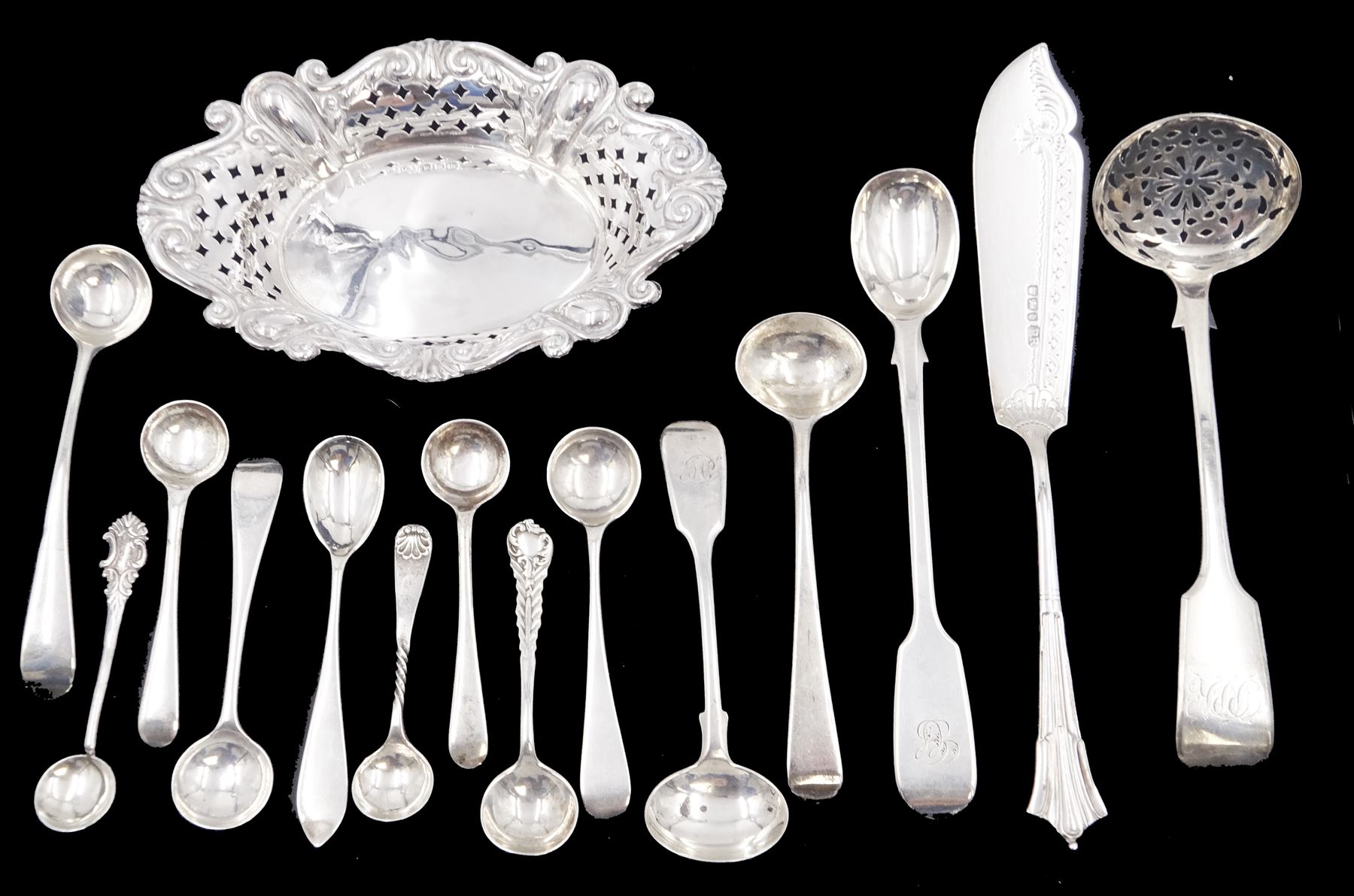 Group of silver, to include Edwardian silver bon bon dish, of oval form, with shaped rim and pierced sides, hallmarked James Dixon & Sons Ltd, Sheffield 1904, together with a Victorian silver sifting spoon, hallmarked Thomas Hart Stone, Exeter 1871, late Victorian butter knife, with bright cut decoration to blade, hallmarked Richard Richardson, Sheffield 1900, and a collection of hallmarked silver condiment spoons including George III example