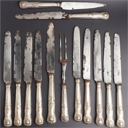 Ten George IV silver Kings pattern table knives, London 1828, the blades marked 'Thomas Bo...