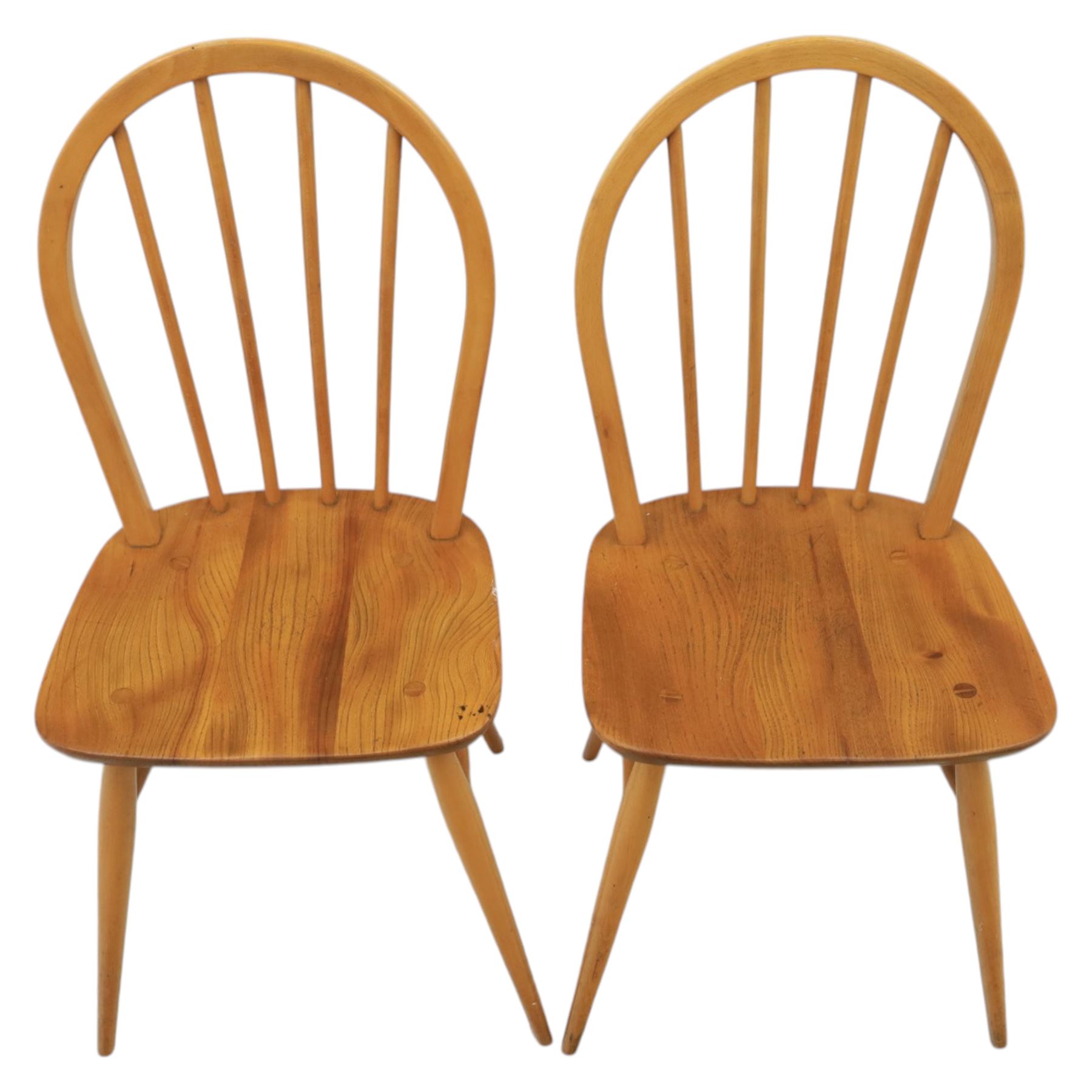 Ercol - set of four 'Windsor' waxed elm chairs, with hoop back design, on tapering supports