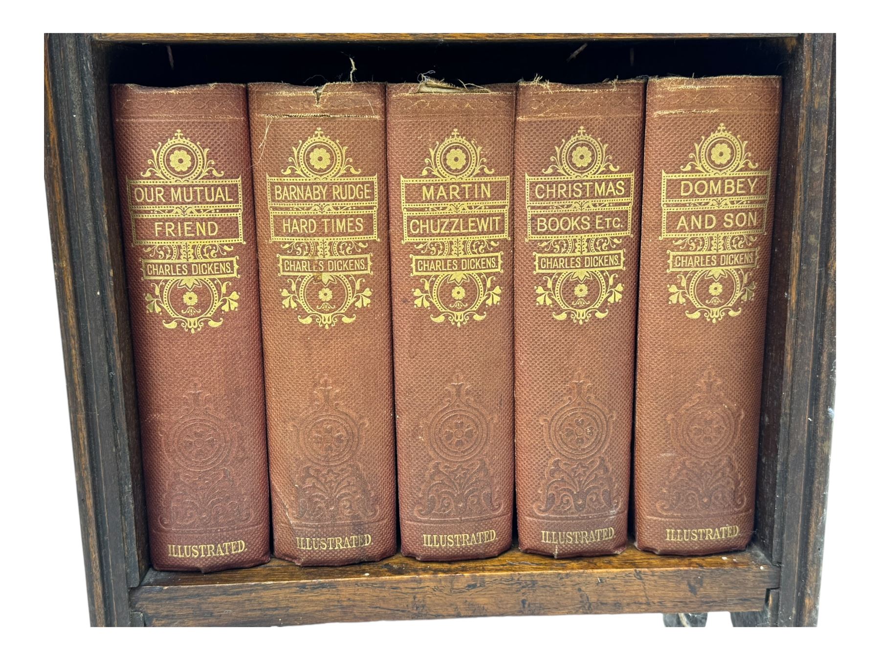 20th century oak barley twist gateleg table (W78cm); early 20th century narrow oak bookcase with Charles Dickens novels (W31cm, H93cm) 