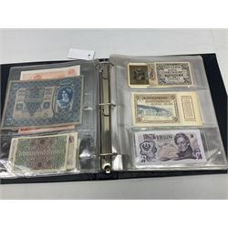World banknotes, including Queen Elizabeth II The States of Jersey one pound 'DB202703', five pounds 'BB527762' and ten pounds 'AB651481', reserve bank of New Zealand two dollars '1L3 741894', King George V Straits Settlements one dollar 1st January 1935 'F/83 28924', various Bank of England notes etc, housed in two ring binder albums