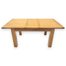 Contemporary oak extending dining table, moulded rectangular top with visible grain and inset extension leaf, pull out extending mechanism, standing on four square legs, accompanied by a set of high slat back chairs with upholstered brown faux leather seats and square tapering supports joined by stretchers