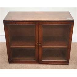  Small early 20th century mahogany table top display cabinet, two glazed doors enclosing single shelf, W64cm, H50cm, D27cm  
