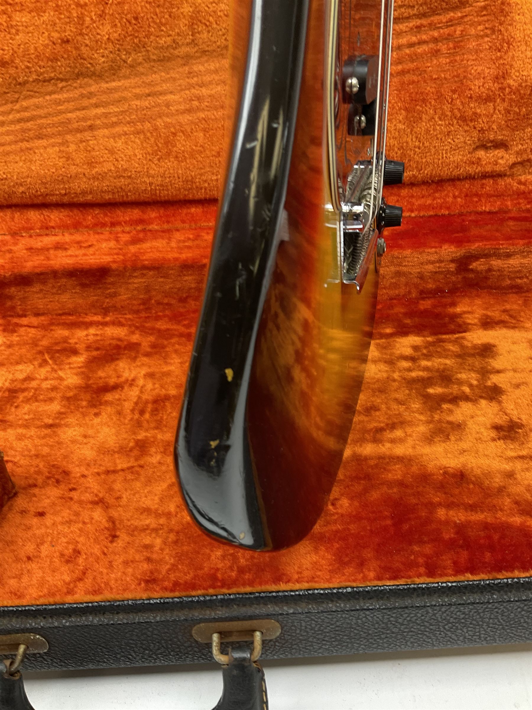 Fender three-tone Sunburst 12-string electric guitar c1965/6 Fullerton USA, with alder body and maple neck, the Indian rosewood fretboard with twenty-one frets and pearloid dot markers, fender electric XII bridge, F-stamp tuners (non-original), two split single coil pick-ups, master volume and tone and four-way switch, serial no.129730, L108cm; in original Fender case bearing label for Rivington Guitars New York with copy of original invoice; together with GuitarKes set-up and service certificate dated October 2021
