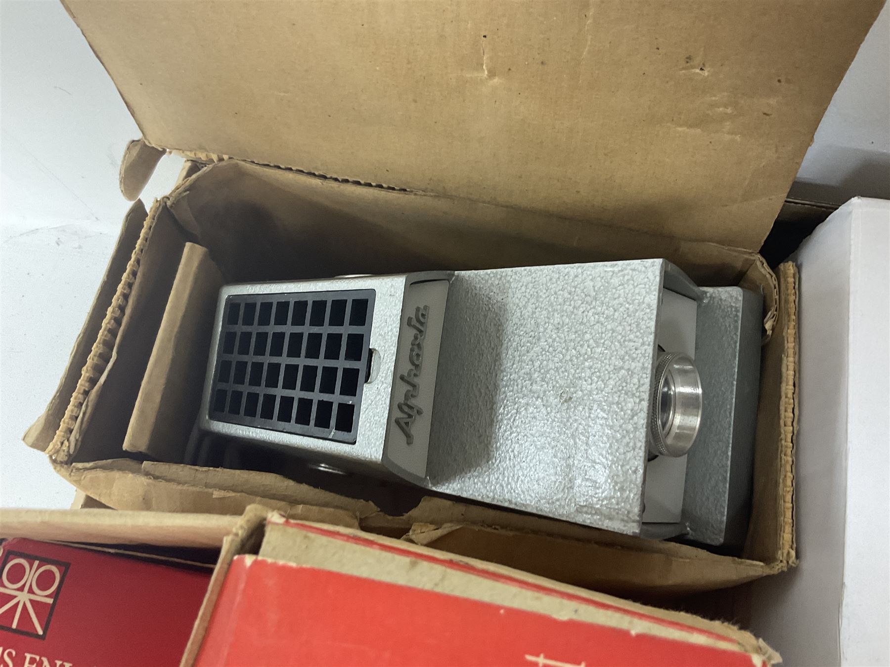 Large collection of projectors and equipment, to include Alphaxia Gnome projector, Kodak Brownie projector, slide containers, projector screen, etc, in six boxes