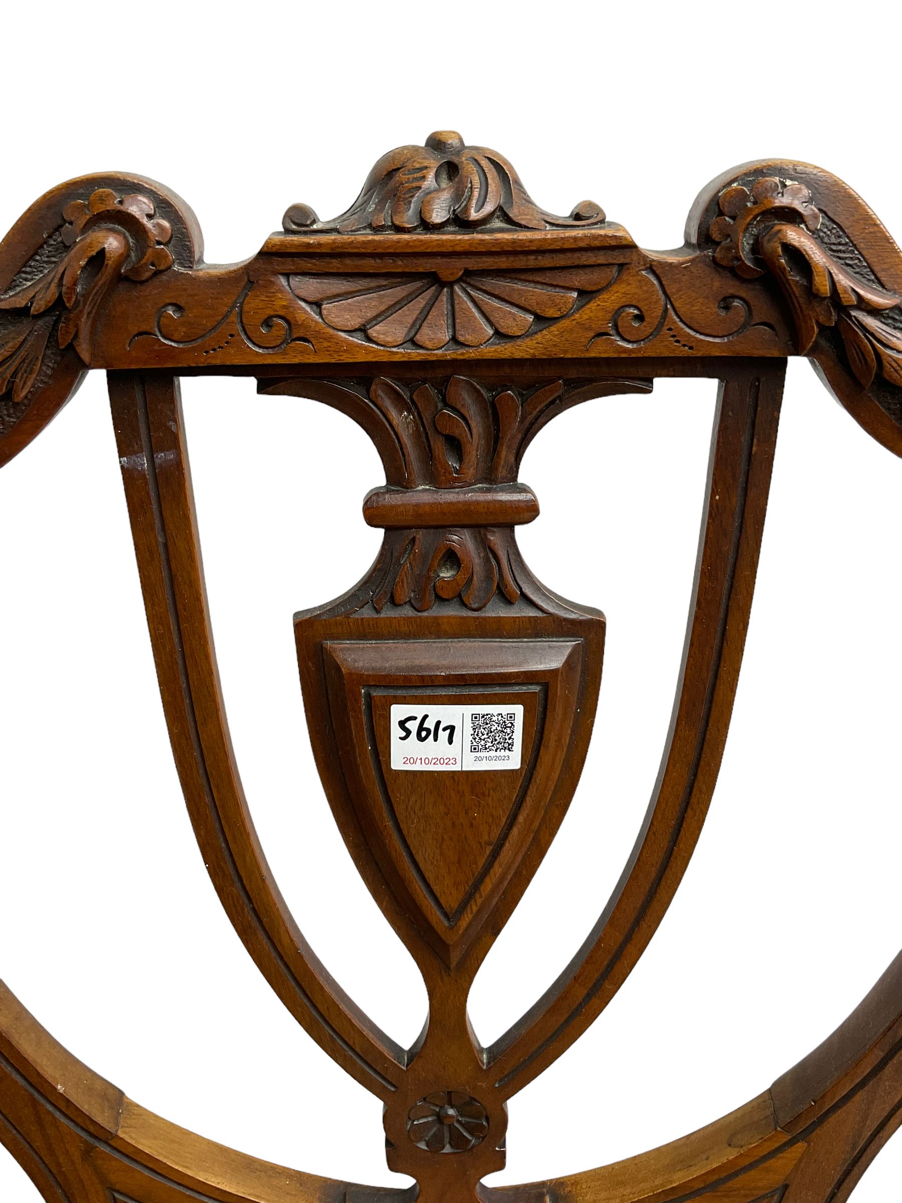 Pair of Regency rosewood framed side chairs, carved back rails over cane seat, raised on reeded supports (W46cm D50cm H84cm); set of three Edwardian walnut cane seat bedroom chairs, carved shield back (W41cm H88cm)