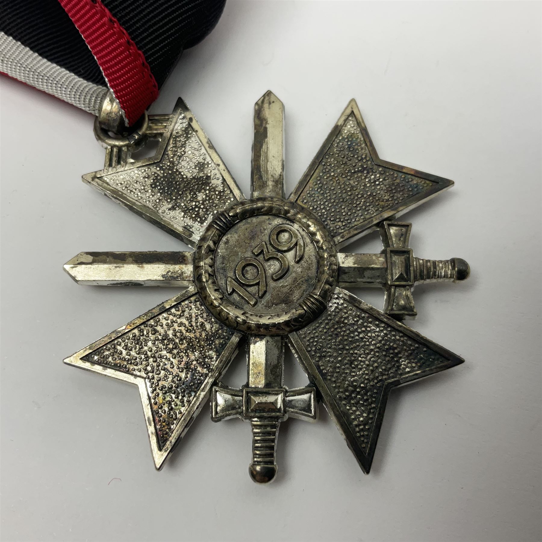 Four German awards c1957 - Knights Cross of the War Merit Cross, War Merit Cross 1st Class, Faithful Service Cross and Silver Wound badge (4)