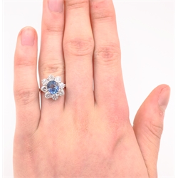  White gold oval sapphire and round brilliant cut diamond cluster ring hallmarked 18ct sapphire approx 2 carat diamonds approx 1.8 carat  