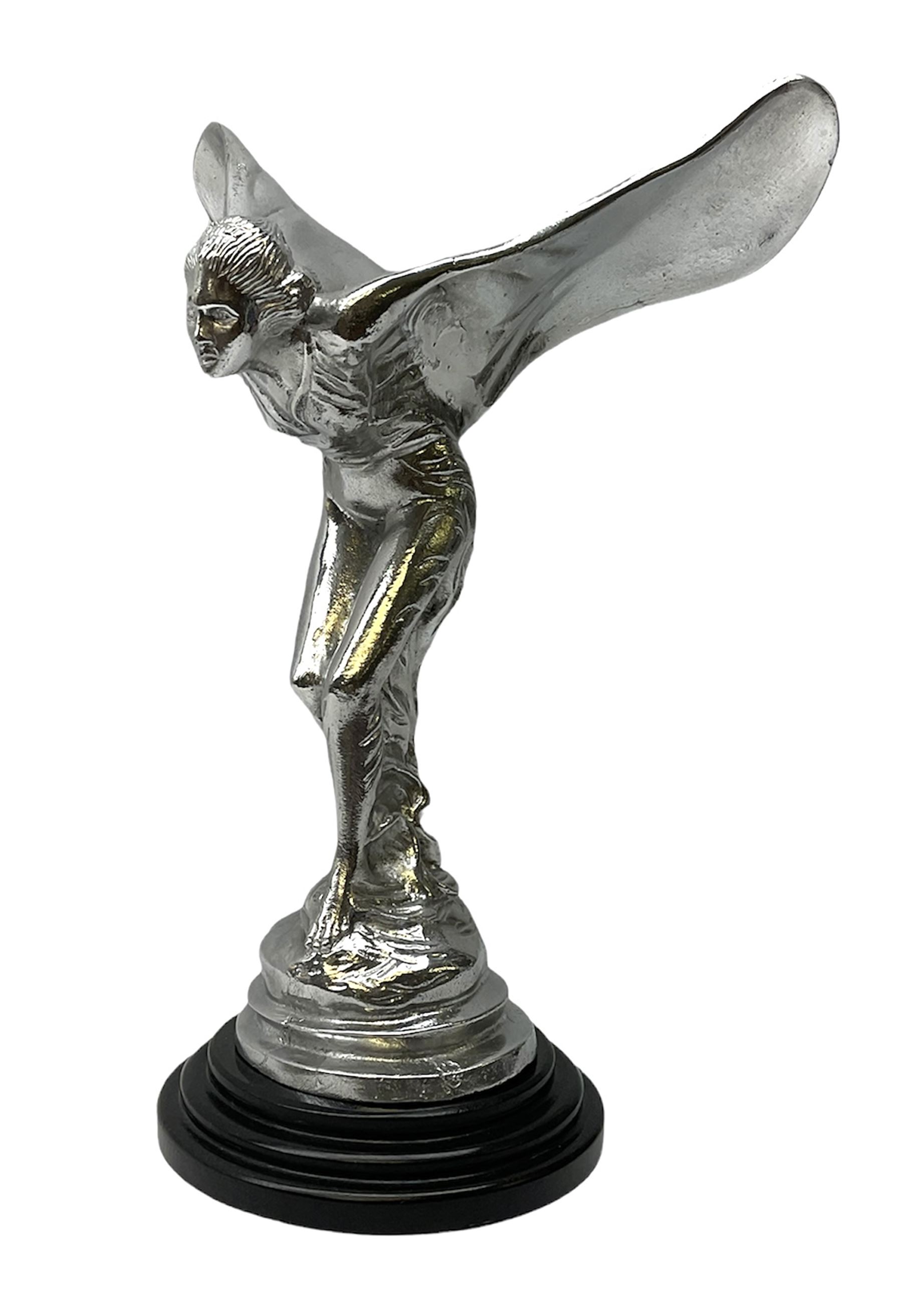 Cast Rolls Royce Spirit of Ecstasy car mascot, raised upon a circular stepped base, H35.5cm