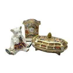  Royal Crown Derby Haiku pattern miniature clock, together with 1128 Imari pattern trinket box with cover and teddy bear figure, all with printed marks beneath   