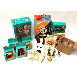  Wallace & Gromit - Boots torch with interchangeable heads, radio and Sandcastle Money Box, all boxed, four boxed Wacky Wind-Up Figures, various boxed and loose figures, Gromit plush hat and Whizza frisbee  