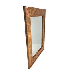 Large copper framed mirror, rectangular bevelled plate, the wide stepped frame with an iridescent finish