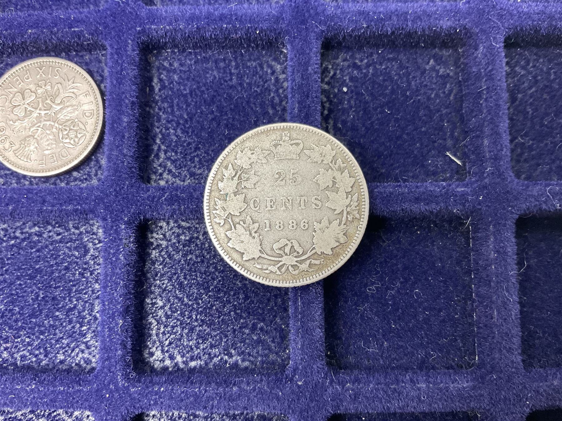 Commemorative, fantasy and other coinage, including George II 1754 farthing, George III 1773 farthing, cartwheel penny and cartwheel two pence, Queen Victoria Canada 1886 twenty five cents, various commemorative crowns etc, housed in three blue coin trays