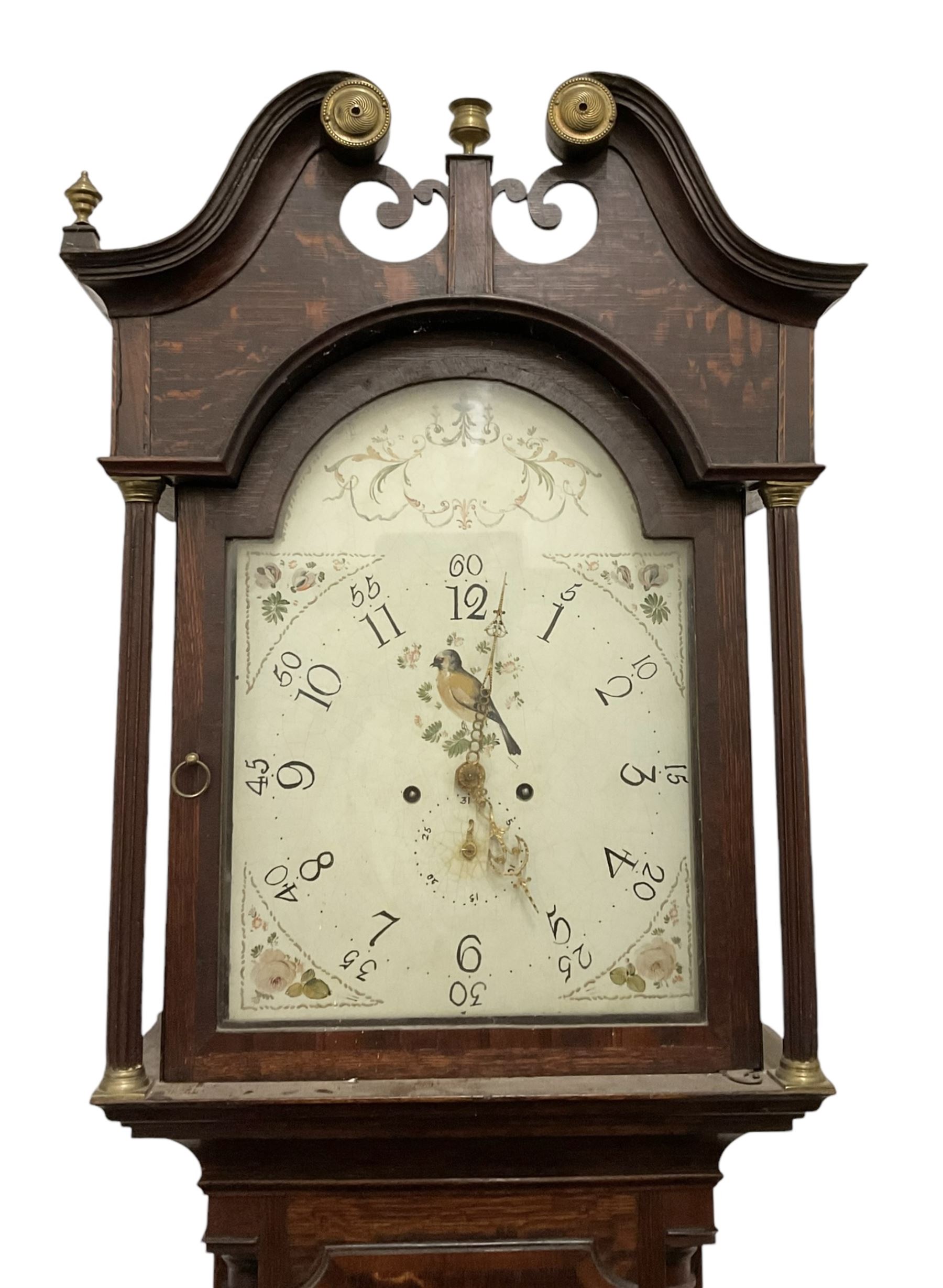 Late 18th century oak 8-day longcase clock, with a swan necked pediment and brass paterie, 
break arch hood door flanked by detached reeded pilasters, trunk with recessed quarter pillars and a long flat topped door, on a square plinth with canted corners, early painted dial with Arabic numerals and floral decoration to the arch and spandrels, with stamped brass hands and date recorder, weight driven two train movement with baluster movement pillars and an internal countwheel strike (bell missing). With pendulum and weights.  No makers name.
