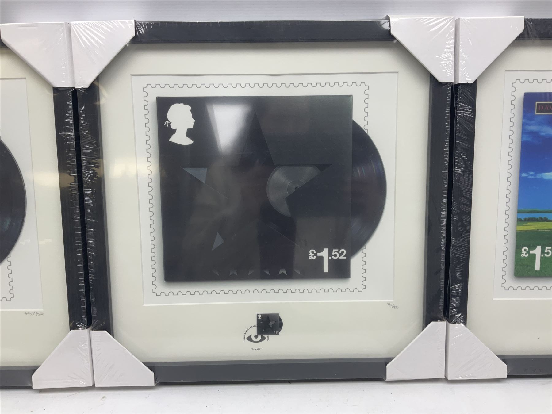 Set of three Royal Mail David Bowie limited edition album stamp prints, comprising Aladdin Sane, Blackstar and Earthling, all framed and in original packaging, H43cm W43cm