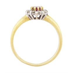 18ct gold ruby and diamond cluster ring, single oval cut ruby of approx 0.25 carat, surrounded by twelve round brilliant cut diamonds, hallmarked, total diamond weight 0.25 carat