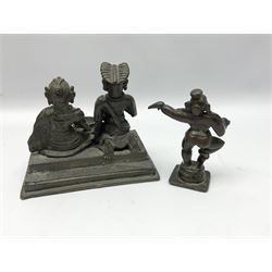 Two Eastern bronze figures, the first example modelled as two praying figures seated and kneeling before a bowl, raised on rectangular stepped base followed by a bronze of a dancing figure, largest H12cm