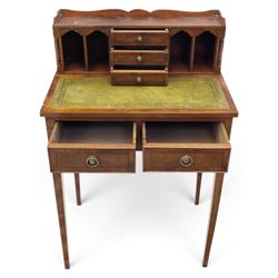 Small Edwardian writing desk, with raised back with three fitted drawers and pigeon holes, above a green tooled leather writing surface, two short drawers with brass ring pulls, square tapering supports