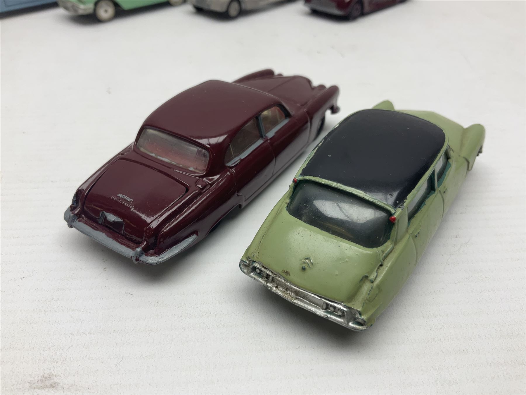 Eleven unboxed and playworn early die-cast models including Dinky Packard, Buick, two Jaguar Mark X and estate wagon, Corgi Mercedes-Benz 300S.L. Roadster, Ford Thunderbird, Citroen DS19 and Bentley Continental Sports Saloon, Spot-On Armstrong Siddeley Sapphire etc; all unboxed (11)