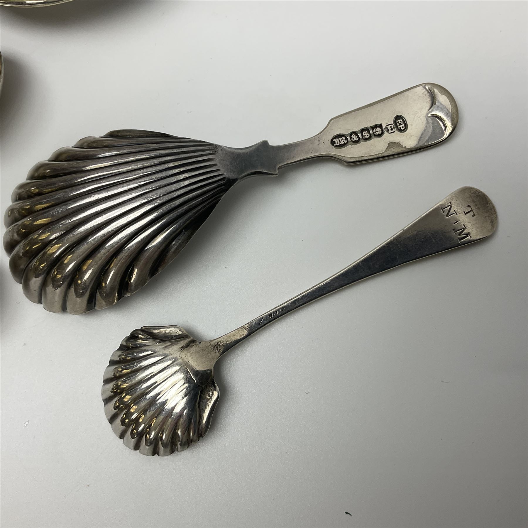 Sheffield silver-plated cruet set, comprising mustard pot, open glass salt and pepper pot on stand, together with a collection of silver plated spoons