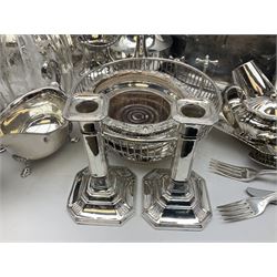 Large collection of silver plate, to include pair of Elkington candlesticks, large meat dome, two bottle coasters, tea wares, flatware, cruets, etc. 