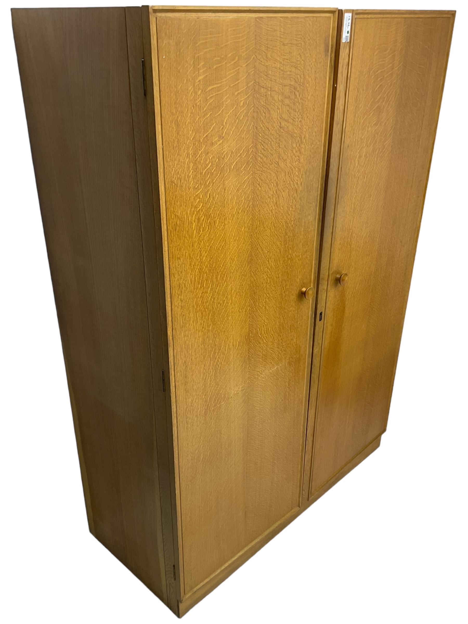 Meredew - mid-20th century oak single wardrobe (W61cm, H153cm, D46cm); and matching double wardrobe (W122cm, H176cm, D54cm)