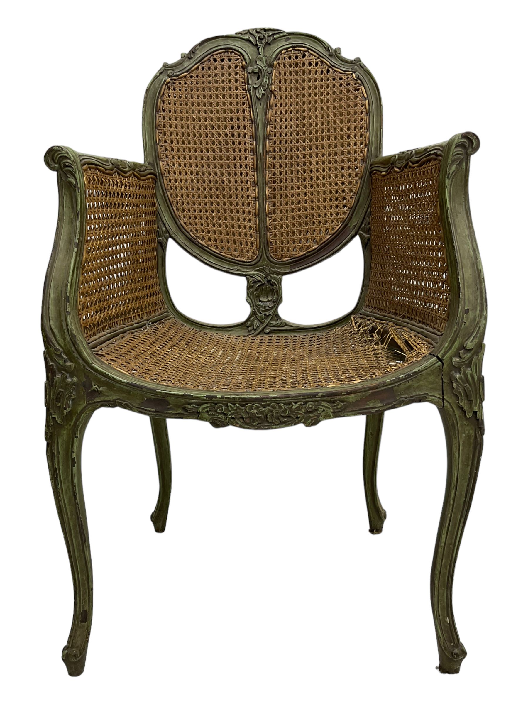 19th century French Louis XV-design armchair, carved and painted wood frame, caned back and seat with scrolled arms, supported by cabriole supports with acanthus leaf decoration