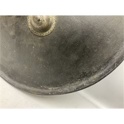 Indian black lacquered hide shield/dhal, of circular convex form with strongly outward-turned brim, fitted at its centre with four metal bosses, each of hemispherical form, with traces of silvered foliate decoration, the bosses corresponding on the inside with four iron rings for enarmes D49cm
