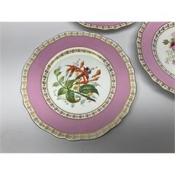 Victorian Copeland, Botanical dessert service, decorated with floral sprigs to the centre with a pink and gilt border, comprising five comports and seven plates, largest comport H20cm, plate D22cm