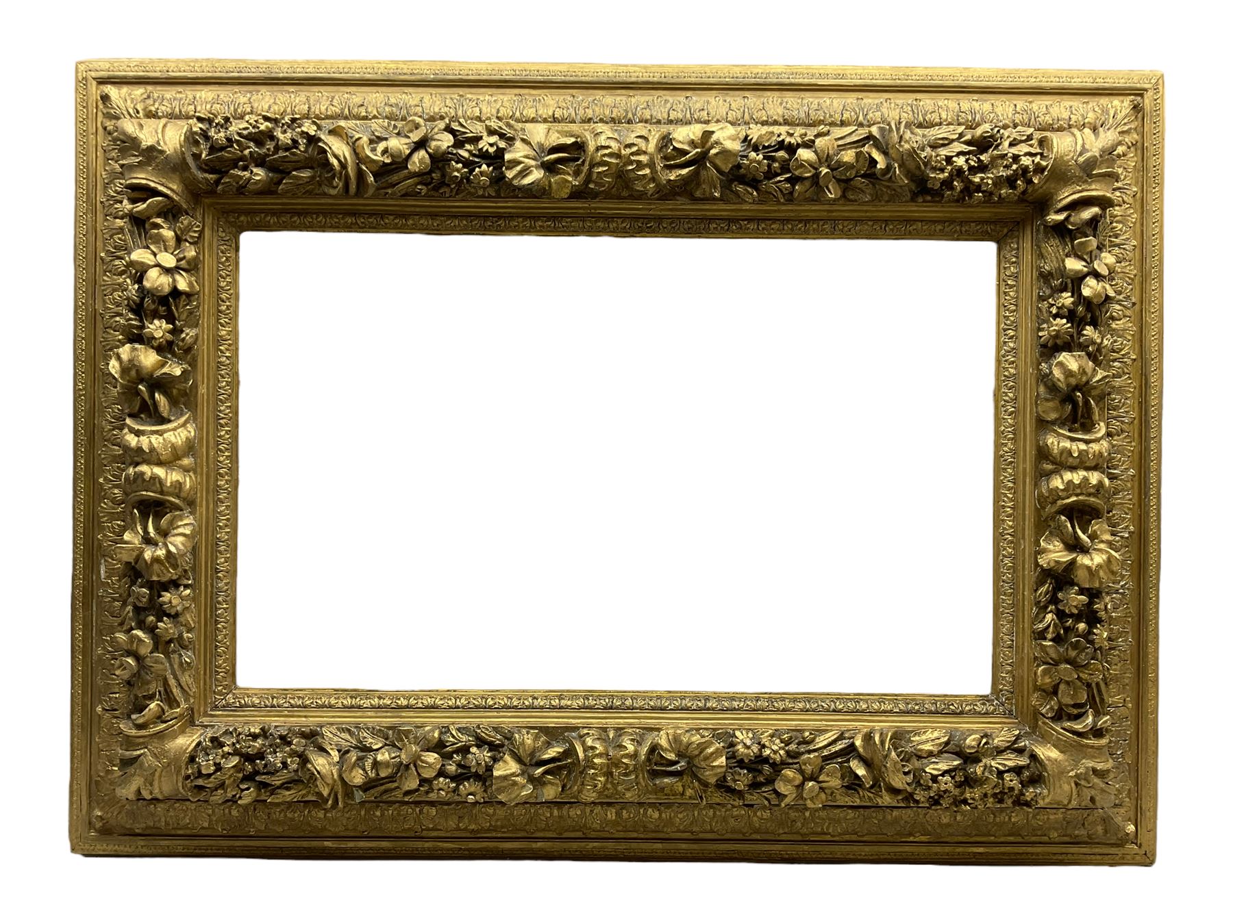 FRAMES Heavy plaster moulded gilt frame, aperture 20" x 32", overall