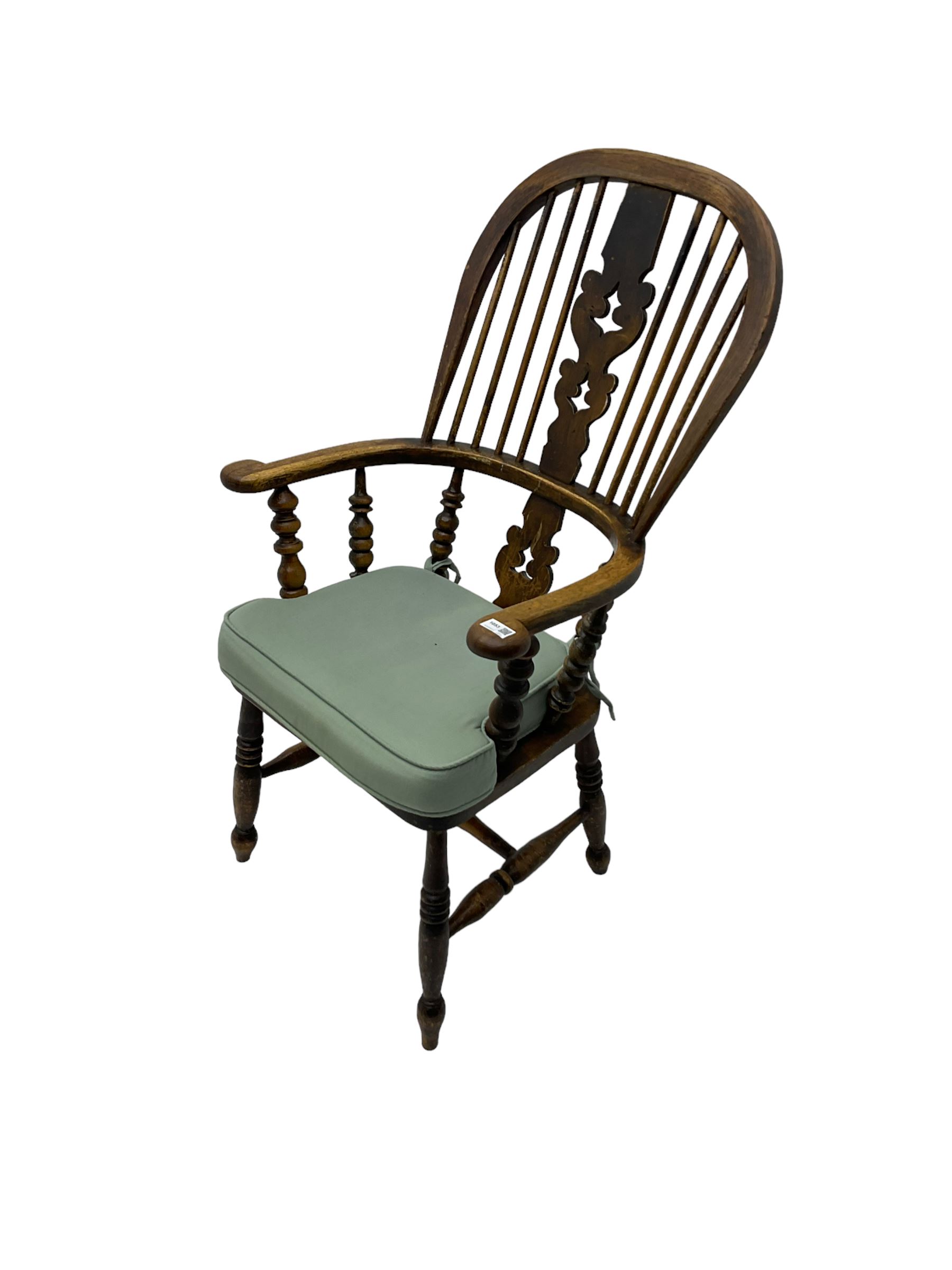 Late 19th century Yorkshire Windsor armchair, high stick back with pierced and fretwork splat, turned supports joined by H-stretcher