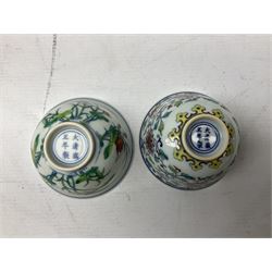 Two Chinese Yixing teapots, Chinese tea bowl hand painted with figures reading, another tea bowl with with underglaze floral panel and another tea bowl with saucer and lid, together with other teacups etc all boxed and with character marks