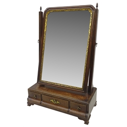  George III mahogany toilet mirror, the shaped rectangular swing plate with gilded gesso slip and later bevelled edge mirror, above one long and two short drawers on ogee bracket feet, H61cm x W40cm x D20cm   