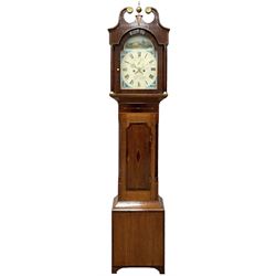Musson of Louth - mid-19th century oak and mahogany 8-day longcase clock, with a swan’s neck pediment and ball and spire brass finial, break arch hood door flanked by reeded pilasters with brass capitals, canted angled trunk, flat topped door with concave corners, rectangular plinth on bracket feet, fully painted break arch dial with Roman numerals and minute track, subsidiary seconds dial and calendar aperture, matching stamped brass hands, eight day rack striking movement with anchor escapement. With weights and pendulum.
H206 W44 D23
Balthazar Musson from Baden (Germany) is recorded as working in Louth from 1835, naturalised 1861-8. Succeeded by his son, George Balthazar 1872-1920. 
