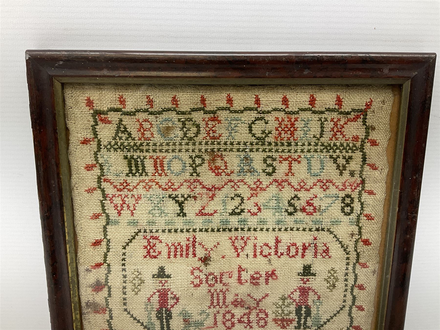 Victorian sampler by Emily Victoria, dated May 1848, worked with the