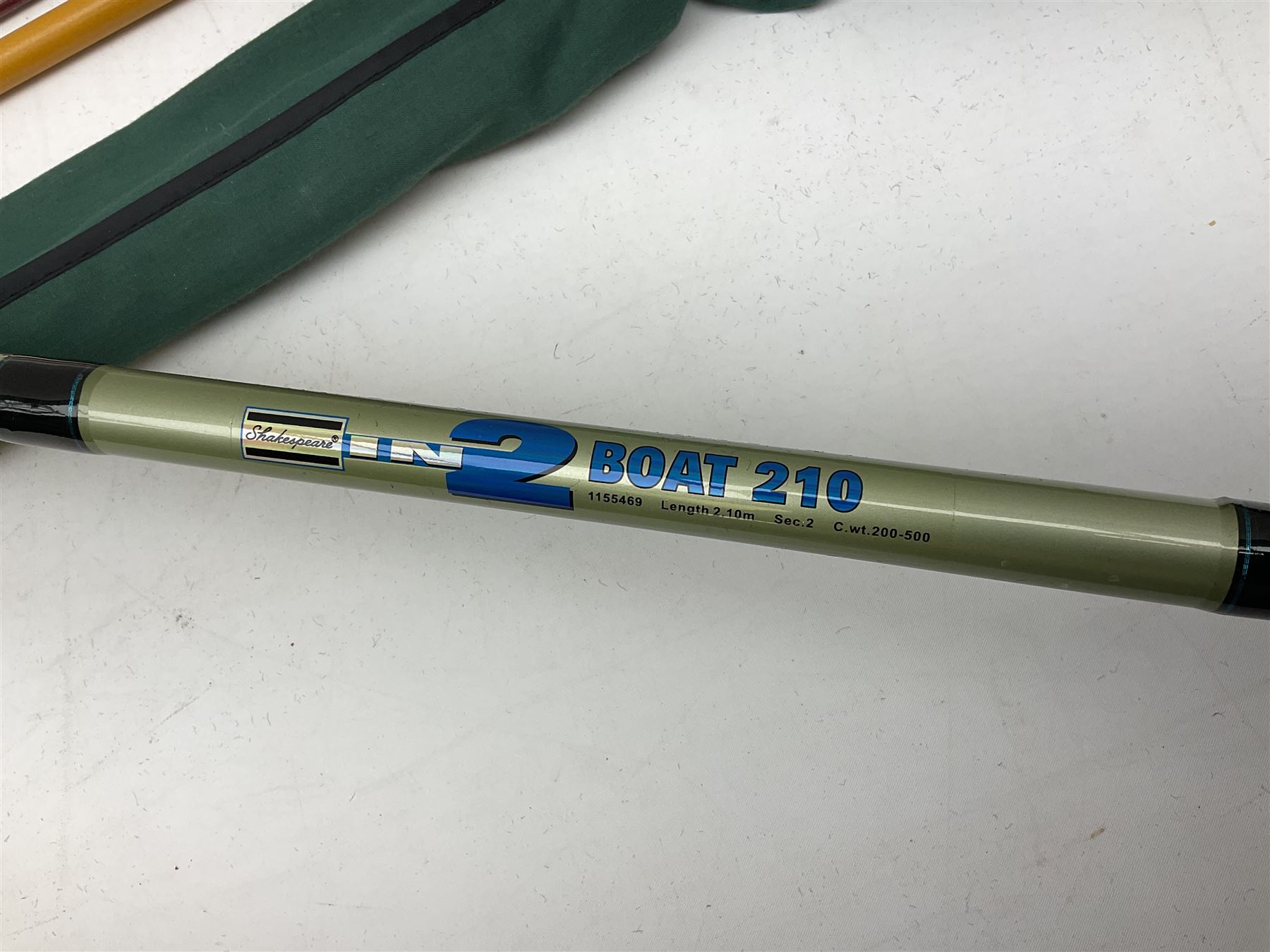 Quantity of fly and sea fishing rods and accessories, to include Shakespeare Boat 210 rod, Daiwa rod and others, and Guang Zhao FLD9000 course fishing reel, Beachmaster 7000FD, Rimfly II amd Penn Super Mariner, tackle etc