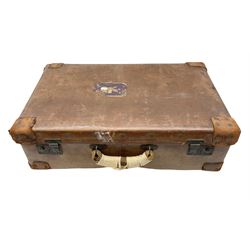 Vintage leather suitcase, by H. J. Cave and Sons of London, with two button slide locks to front, leather handles, reinforced leather corners, manufacturer's label to interiors, L64cm